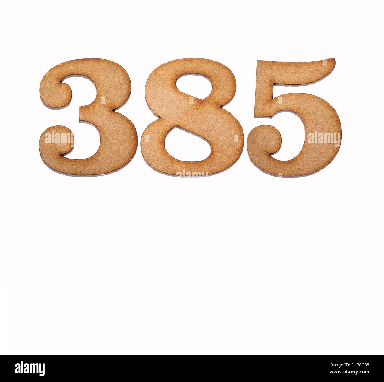Number 385 - Piece of wood isolated on white background Stock Photo - Alamy