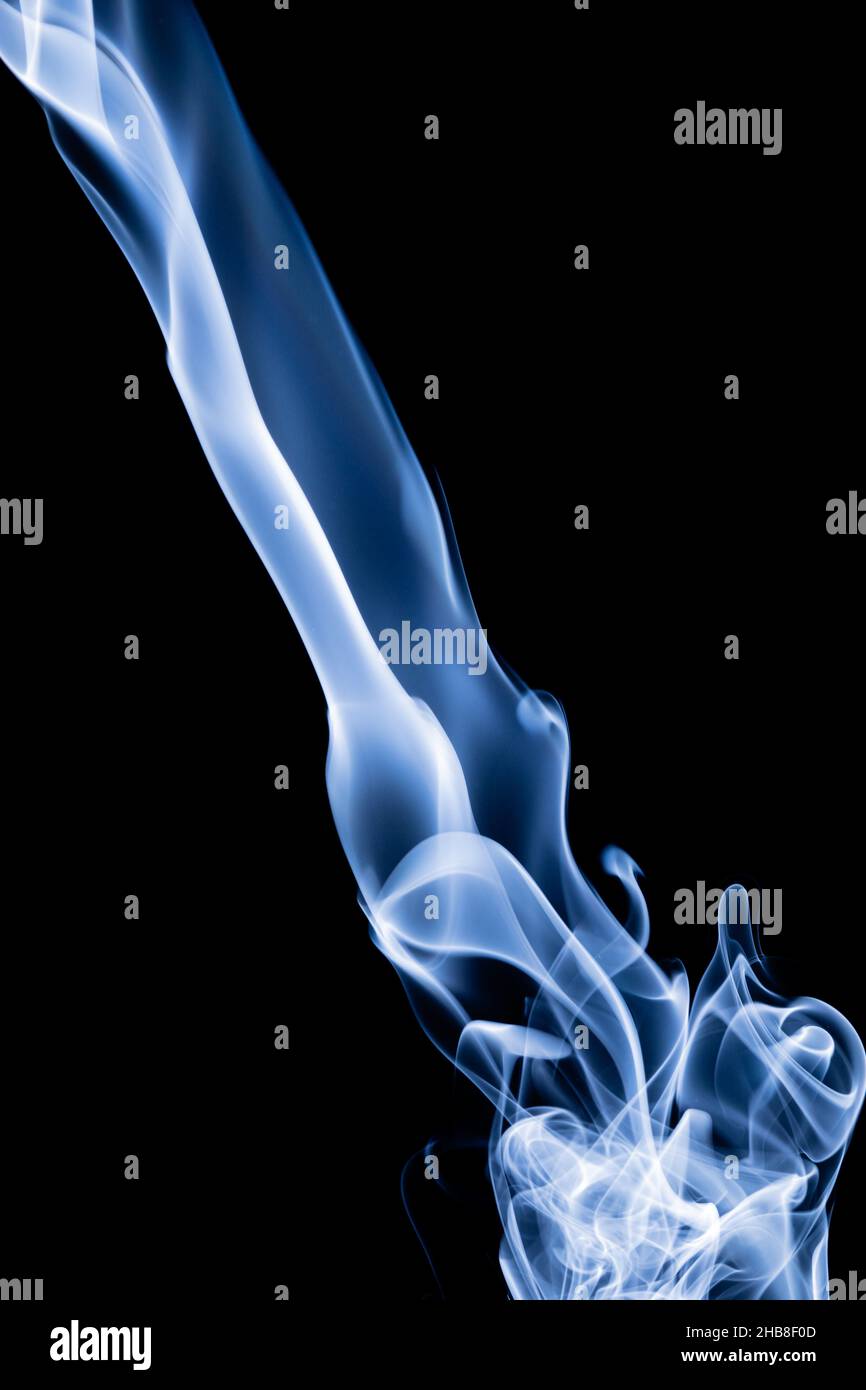 Blue color abstract smoke on black background Stock Photo - Alamy