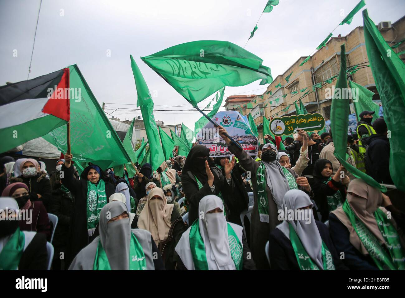 Palestinians take part in a rally marking the 34th anniversary of Hamas' founding, in Gaza City, on December 17, 2021. Stock Photo