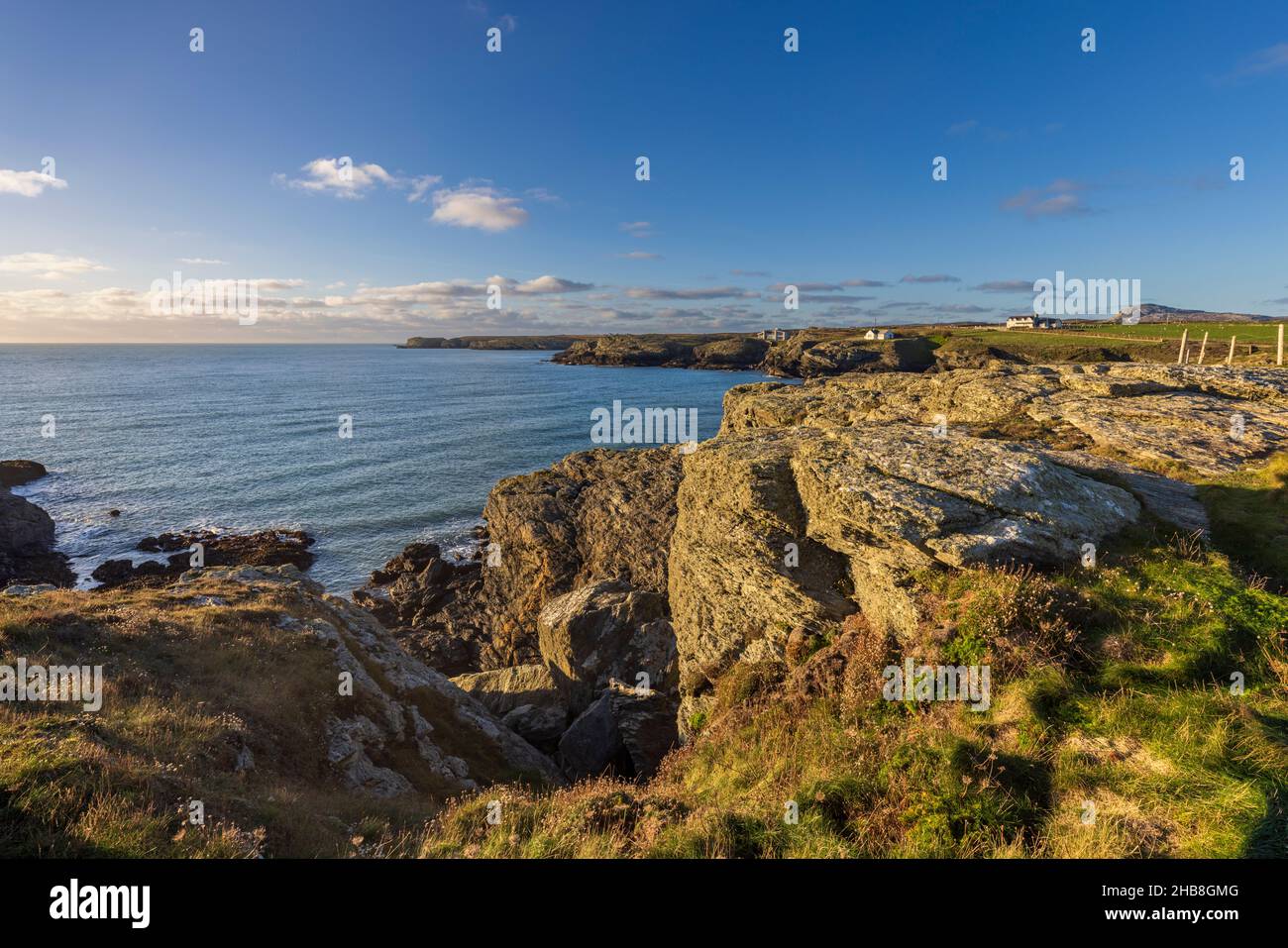 A view of Porth yr Post from the rocky coastline of Holy Island near Trearddur, Isle of Anglesey, North, Wales Stock Photo