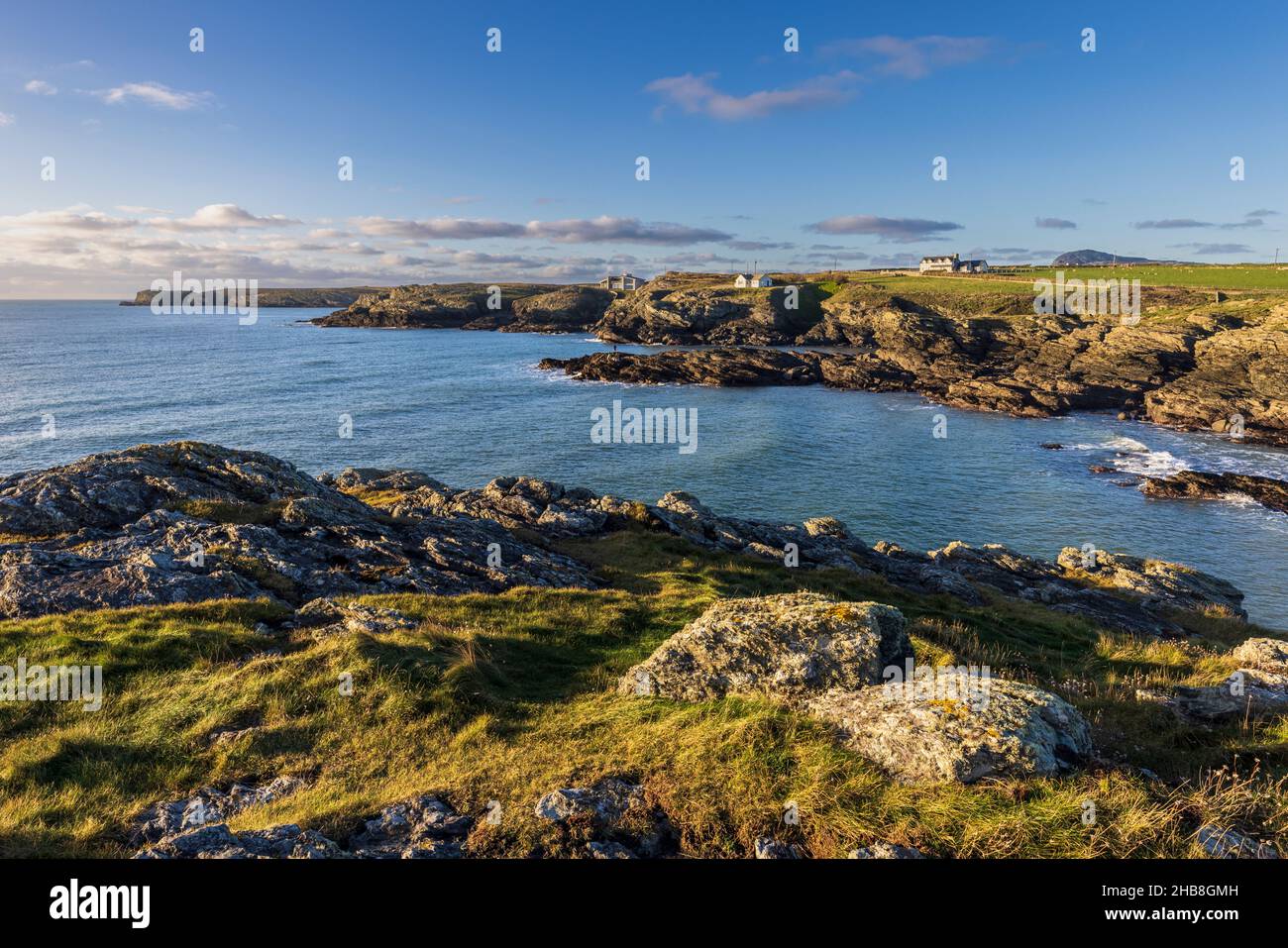 A view of Porth yr Post from the rocky coastline of Holy Island near Trearddur, Isle of Anglesey, North, Wales Stock Photo