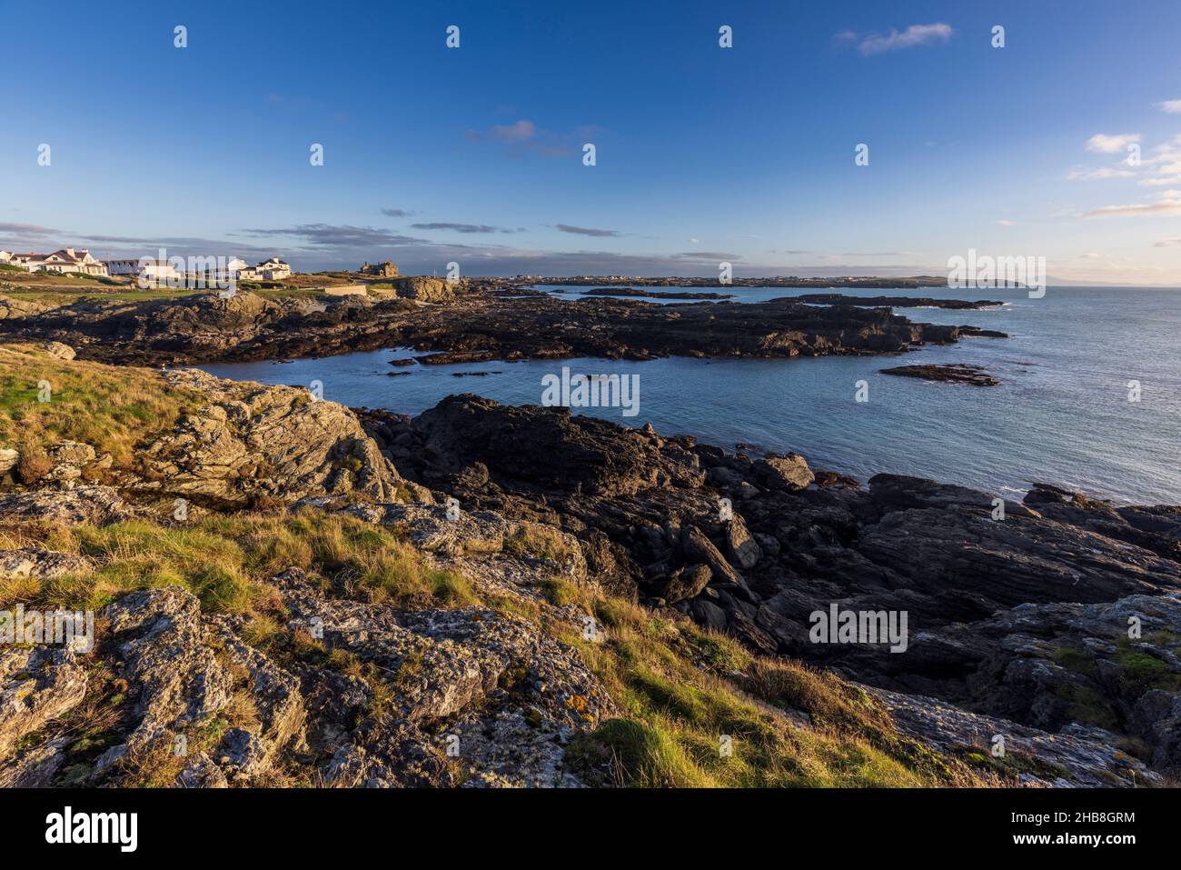 A view of Porth yr Pwll from the rocky coastline of Holy Island near Trearddur, Isle of Anglesey, North, Wales Stock Photo