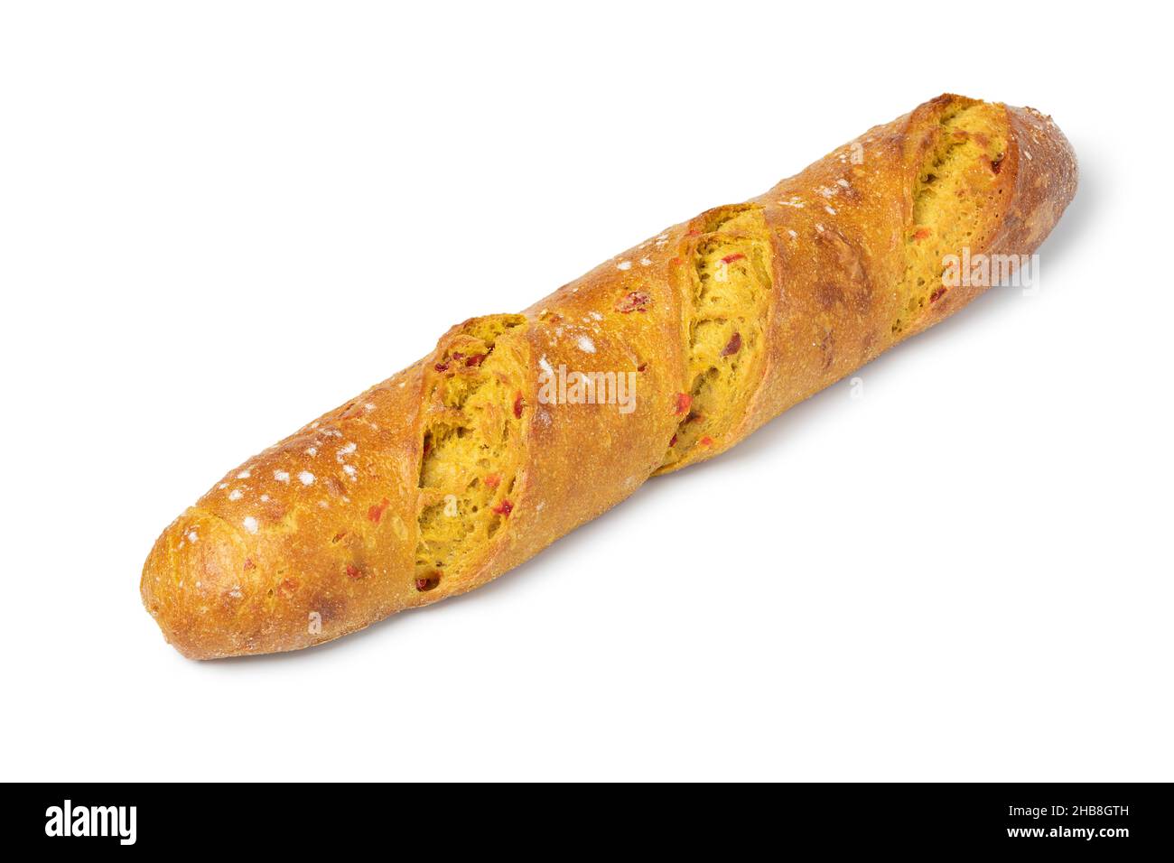 Single fresh baked homemade baguette with curry and tomato seasoning isolated on white background Stock Photo