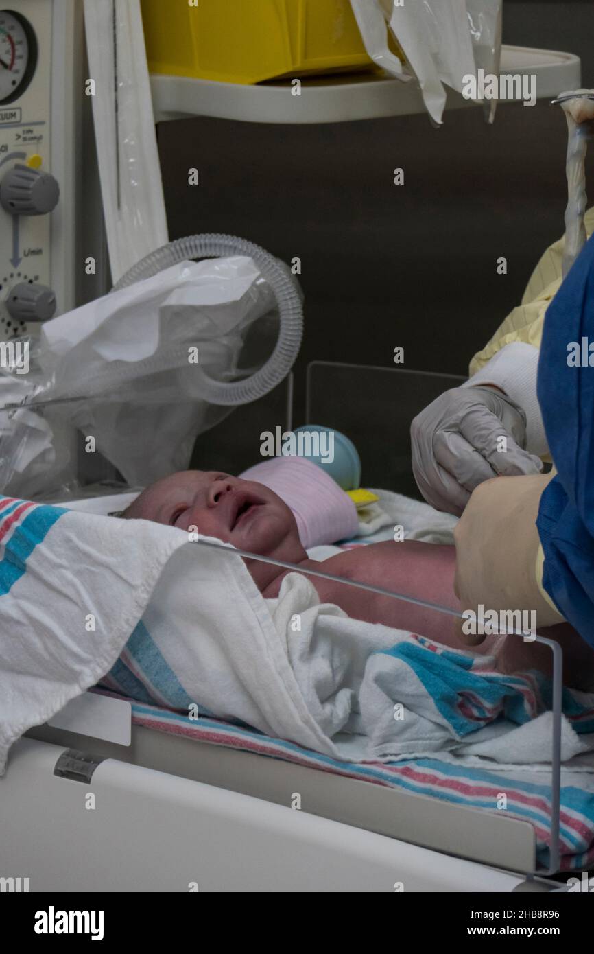 Newborn baby crying in hospital hi-res stock photography and images - Alamy
