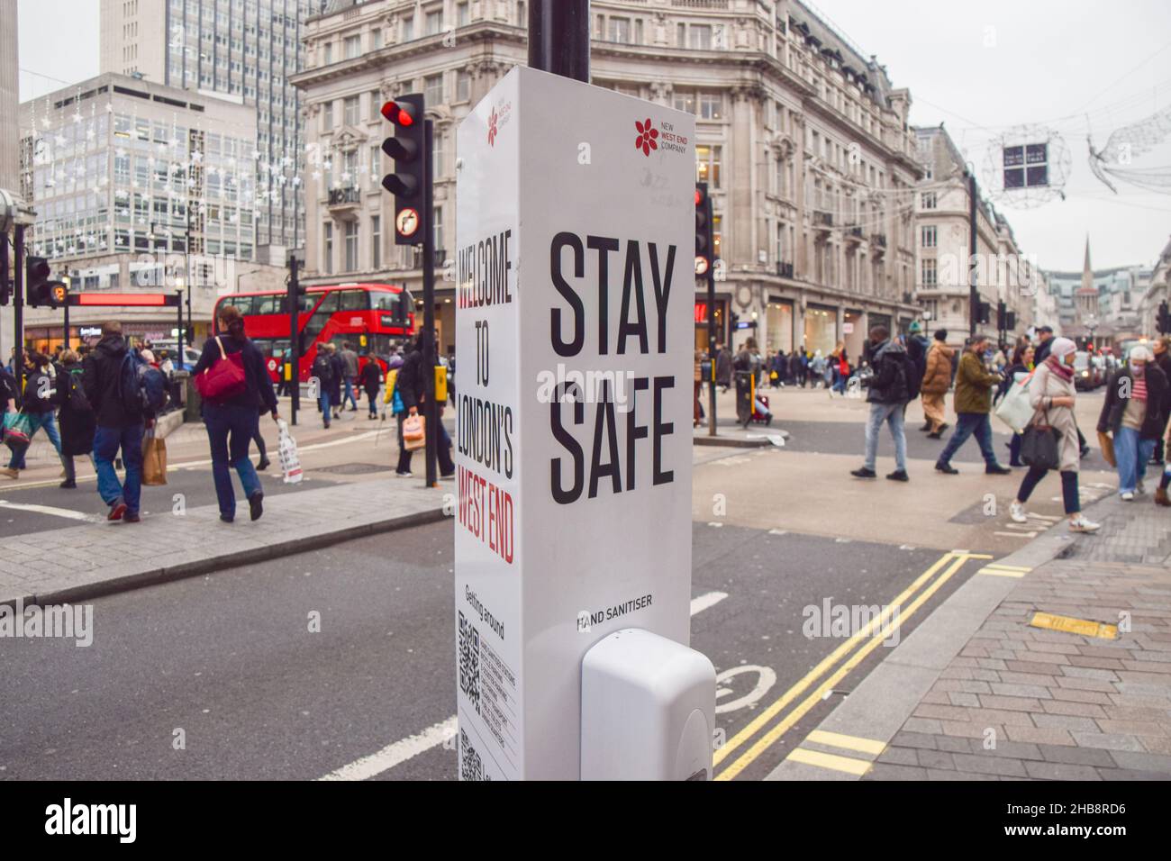 London, UK. 17th Dec, 2021. 'Stay Safe' signs with hand sanitizers have been installed in Oxford Circus, one of the capital's busiest areas, as the Omicron variant of COVID-19 spreads in the UK. (Credit Image: © Vuk Valcic/SOPA Images via ZUMA Press Wire) Credit: ZUMA Press, Inc./Alamy Live News Stock Photo