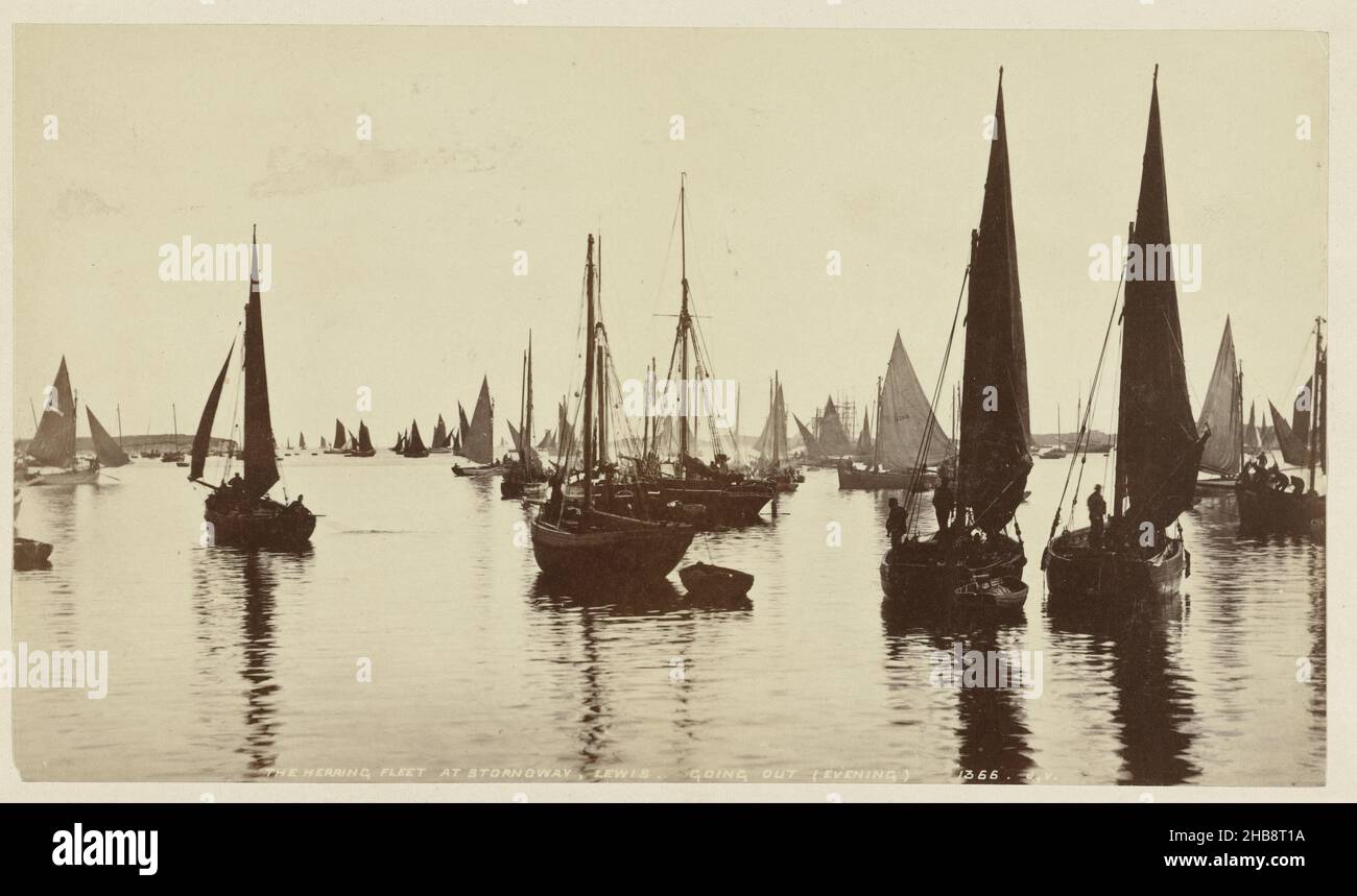 Herring ships at Stornoway on Lewis, The Herring Fleet at Stornoway, Lewis. Going out (evening) (title on object), James Valentine (mentioned on object), Lewis, 1851 - 1880, paper, cardboard, albumen print, height 115 mm × width 200 mmheight 230 mm × width 290 mm Stock Photo