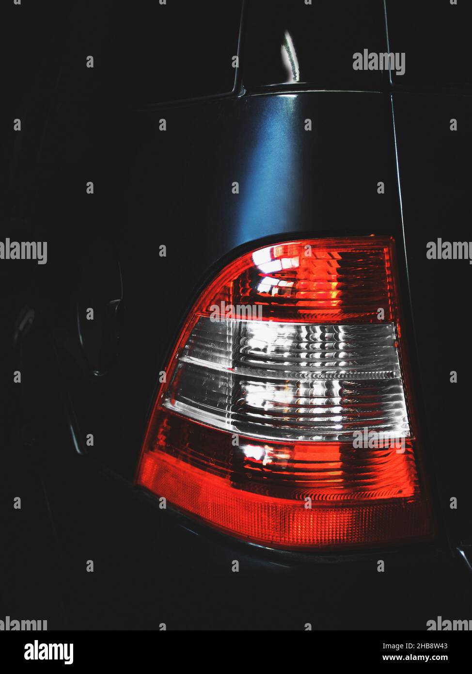 Car in the shade. Car headlights. Luxury Headlights. Car details. Part