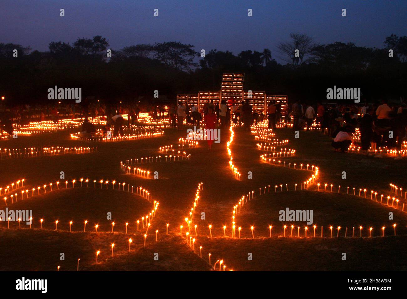 A grand function in remembrance of the martyrs of the language movement, Ekushey Udjapon Committee of Narail arranges one-lakh candles lighting in Nar Stock Photo