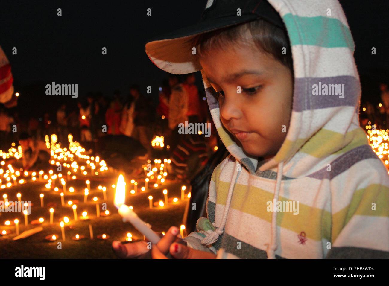 A grand function in remembrance of the martyrs of the language movement, Ekushey Udjapon Committee of Narail arranges one-lakh candles lighting in Nar Stock Photo