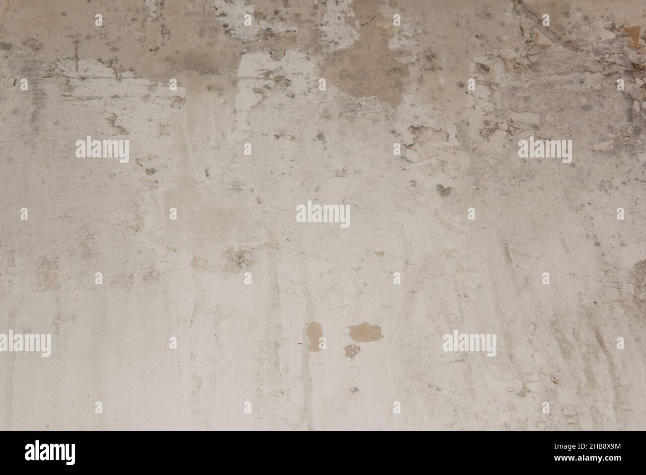 Shabby putty background. Vintage ancient background. Light shade textured old wall Stock Photo