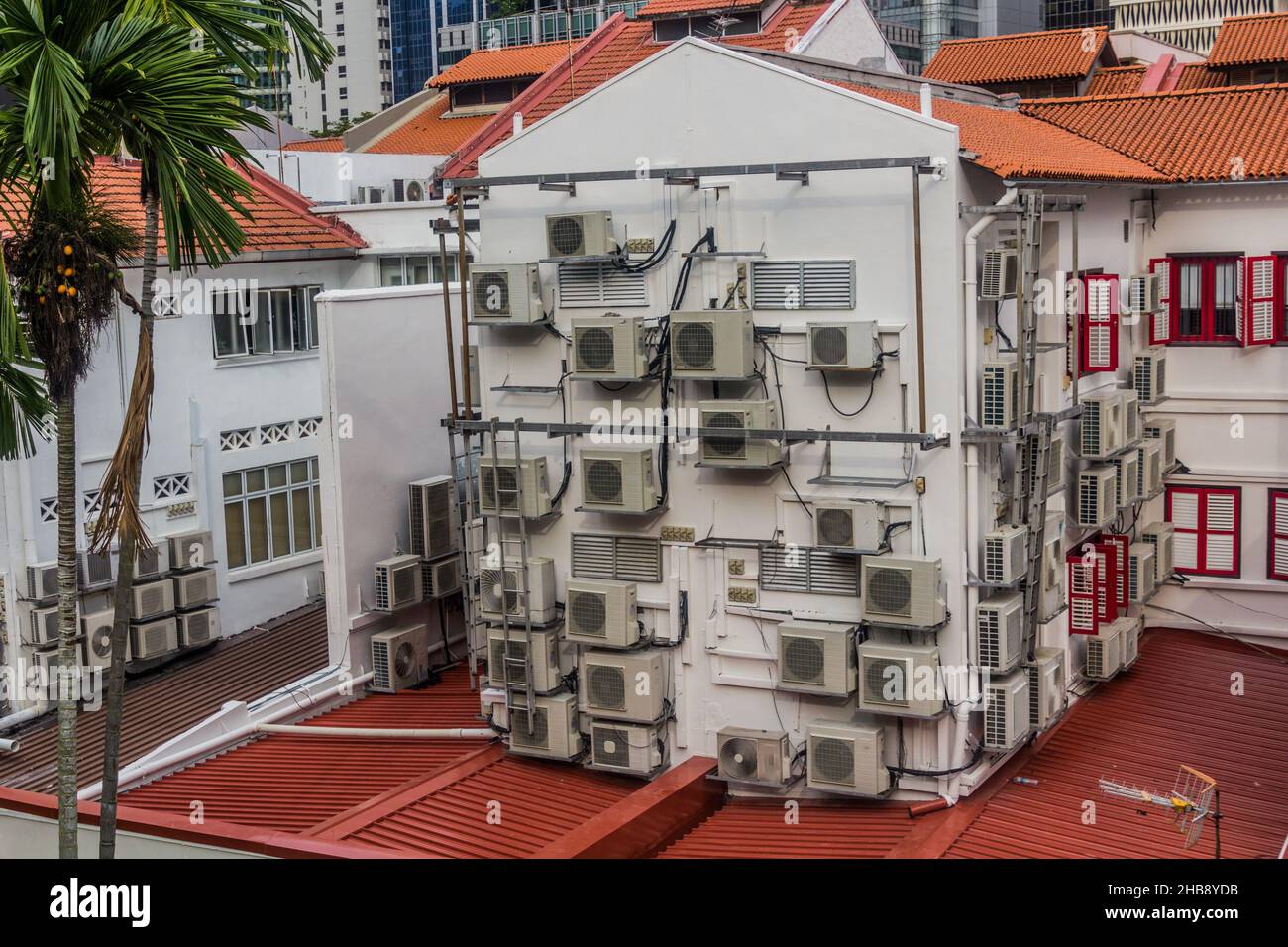 Building with many air conditioning units in Singapore Stock Photo Alamy