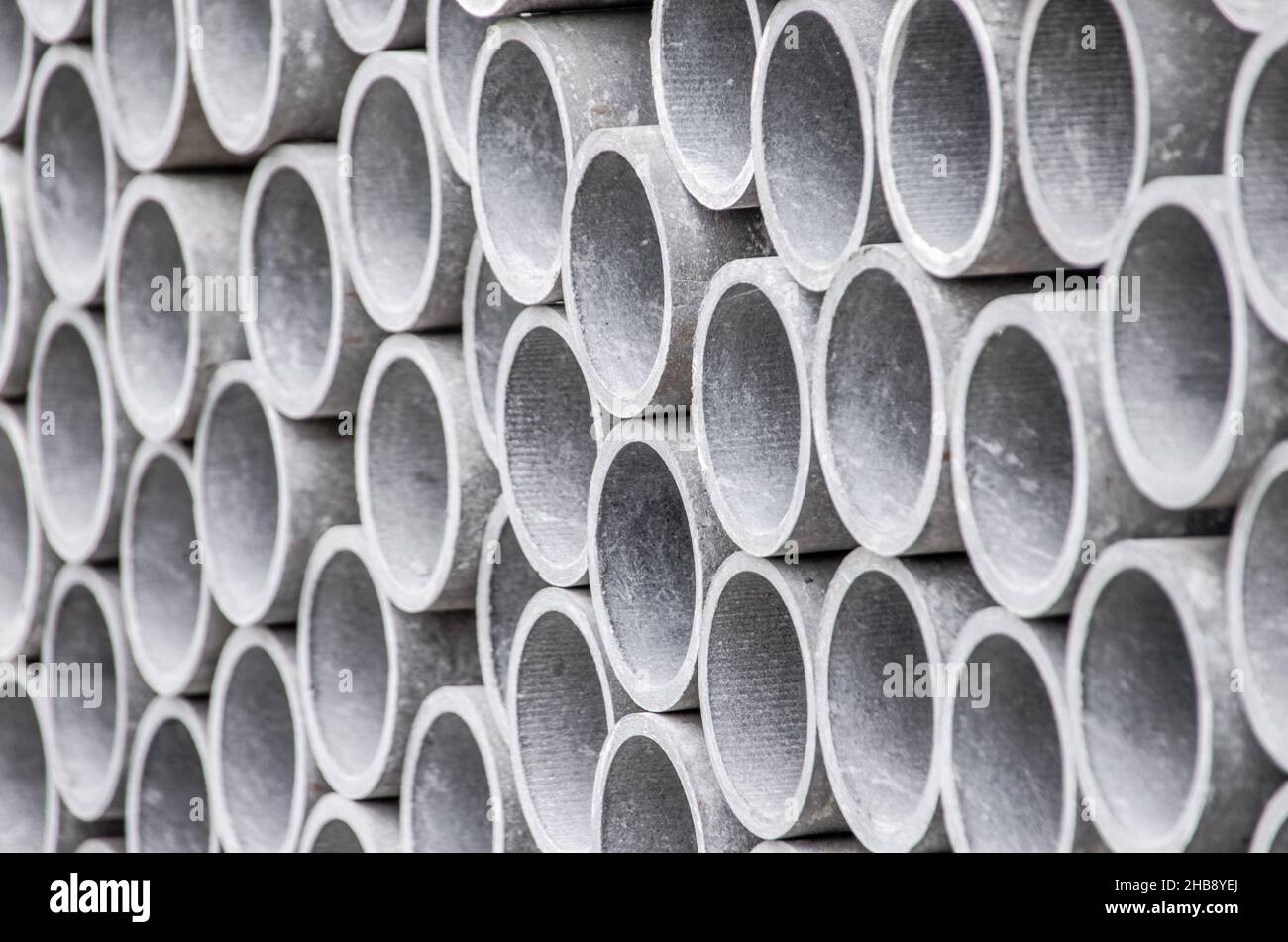 Asbestos pipes background Stock Photo - Alamy
