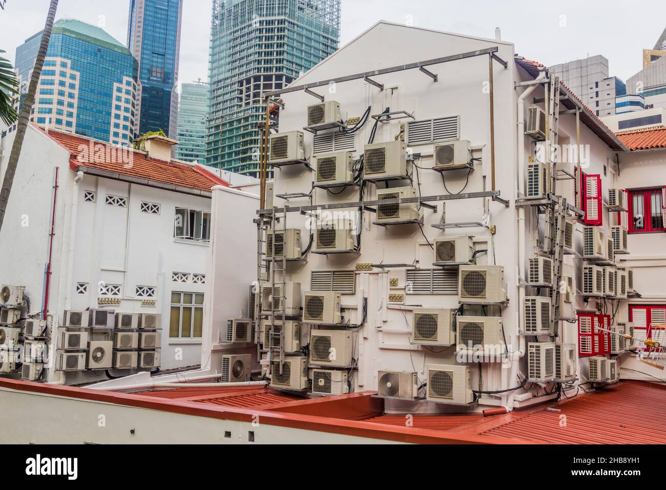 Building with many air conditioning units in Singapore Stock Photo Alamy