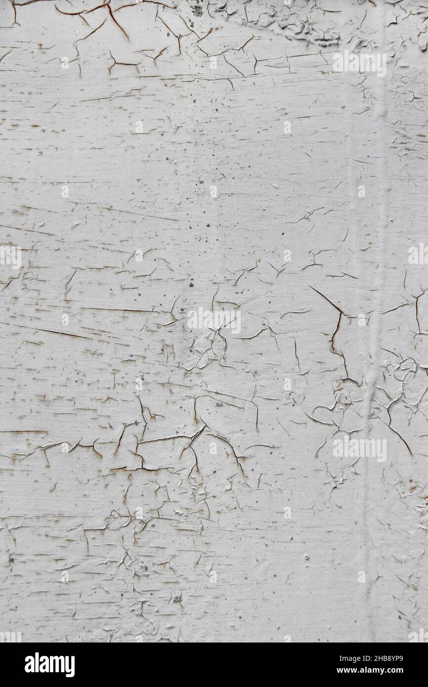 Shabby old paint background. Vintage ancient background. Gray tint of textured old wall. Cracked paint Stock Photo