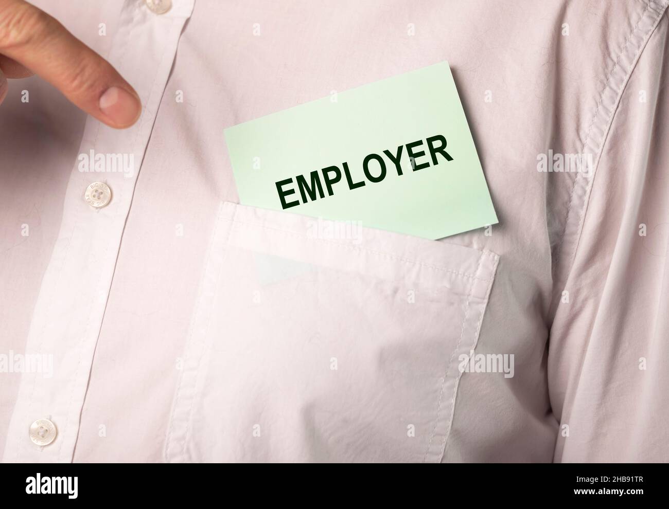 Employer word on paper in mans pocket. Stock Photo