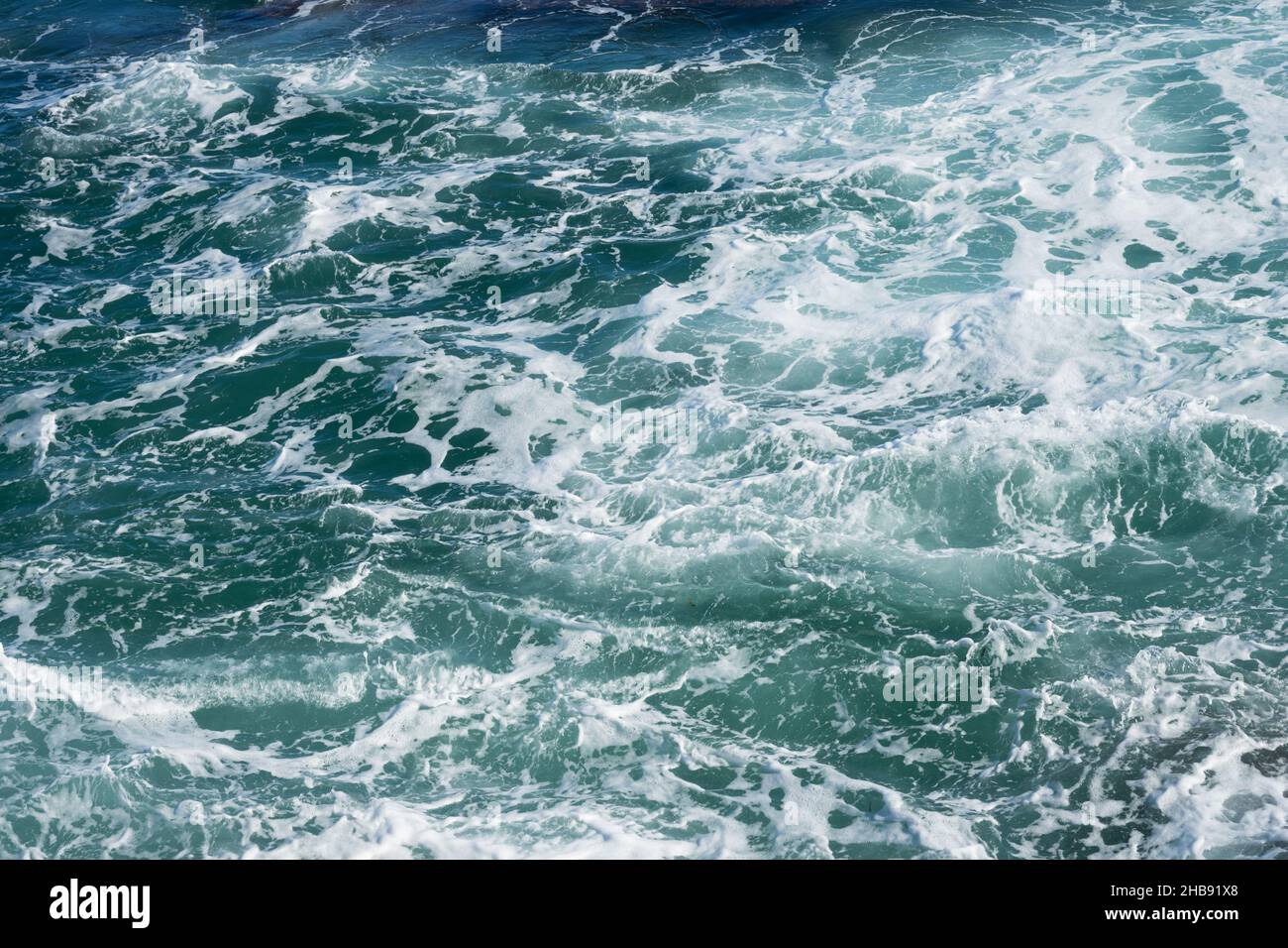 turbulent mediterranean sea with waves and foam natural water background Stock Photo