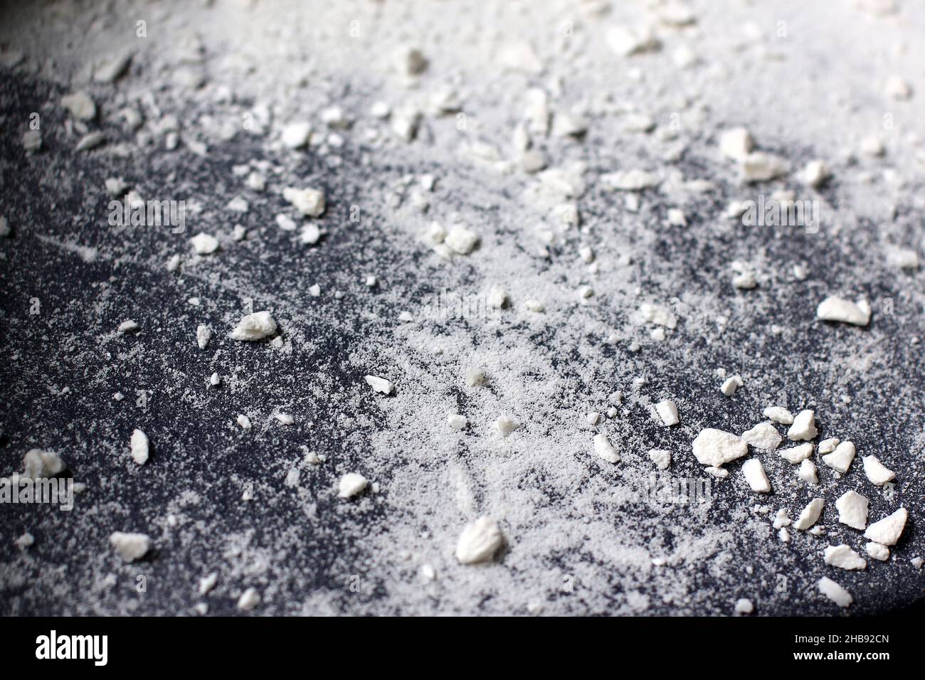 White dust. White powder. Scattering white particles. Abstract background Stock Photo