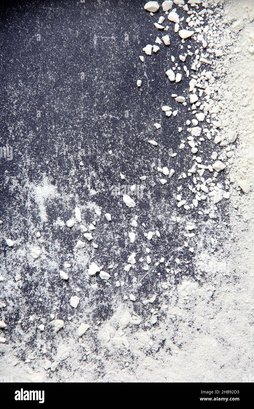 White dust. White powder. Scattering white particles. Abstract background Stock Photo