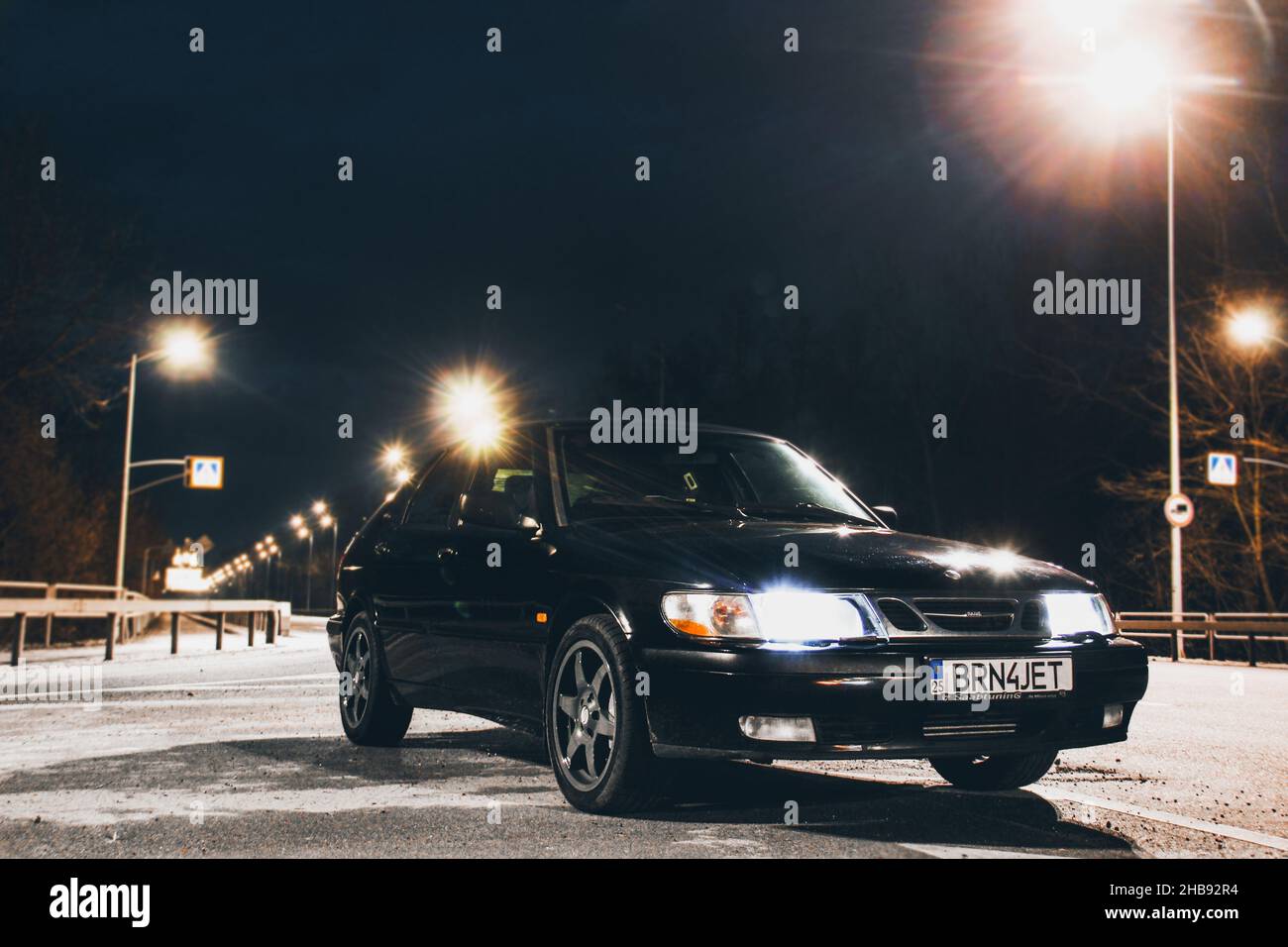 Chernigov, Ukraine - March 20, 2021: Old Swedish car Saab 900 Turbo. Car on the night road. Night photo Stock Photo