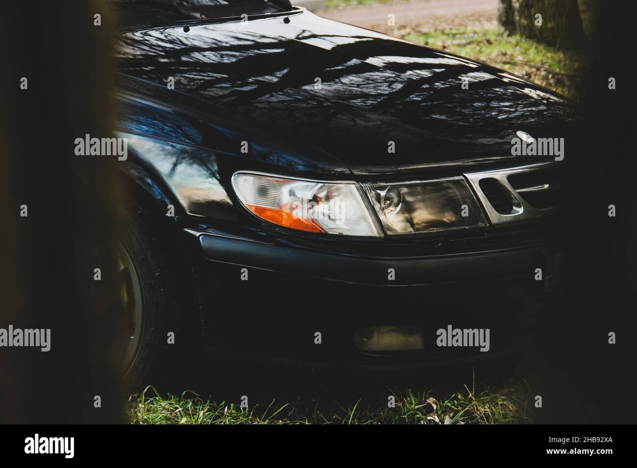 Chernihiv, Ukraine - March 20, 2021: Old Swedish car Saab 900 Turbo in the forest. Abstract photo Stock Photo