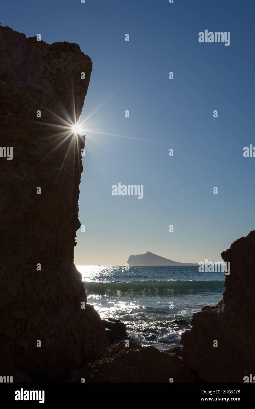 beautiful view of the mediterranean sea and silhouette of rocks with sunlight Stock Photo