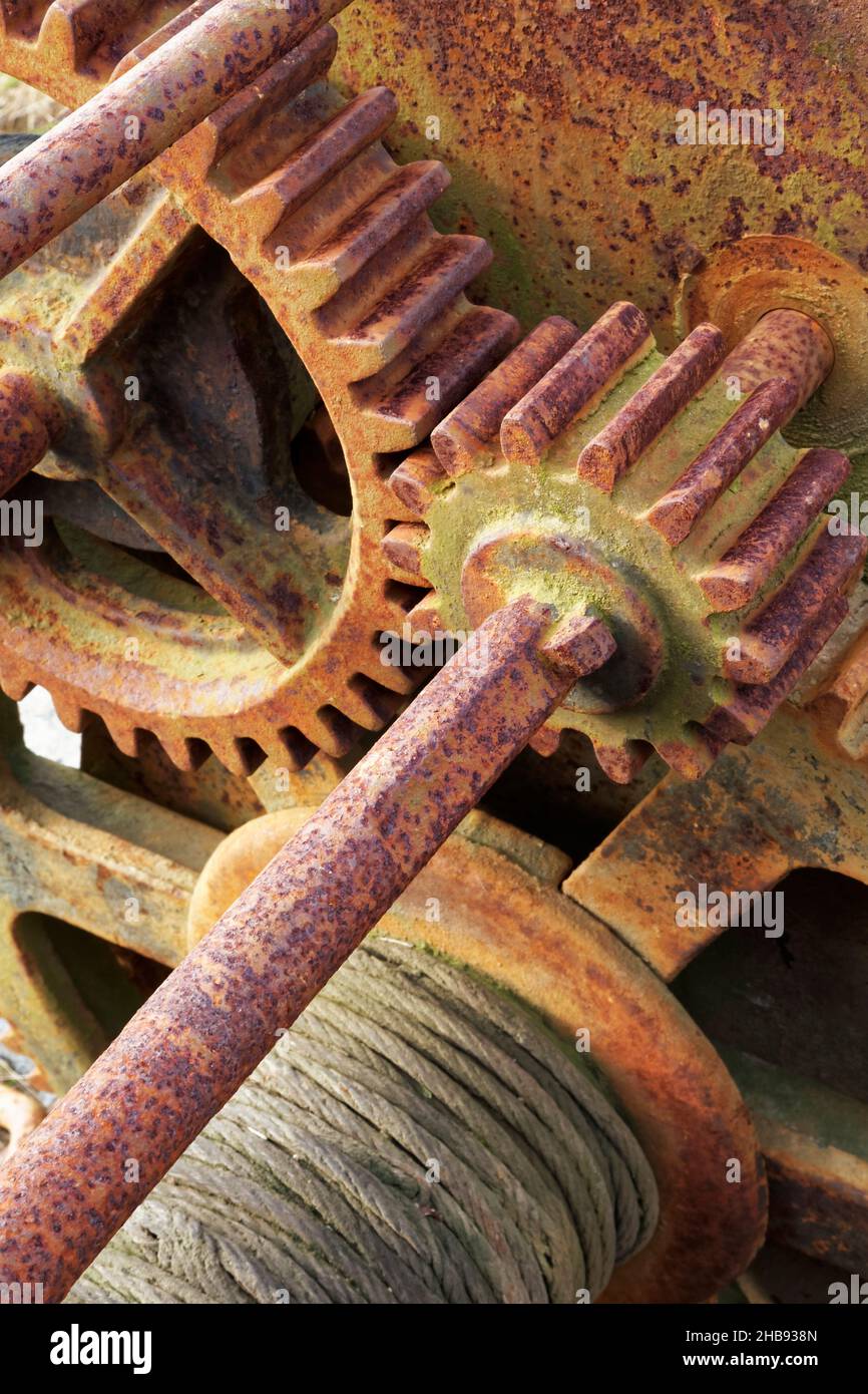 Close up of Rusty cog wheels in a cable winch. Stock Photo