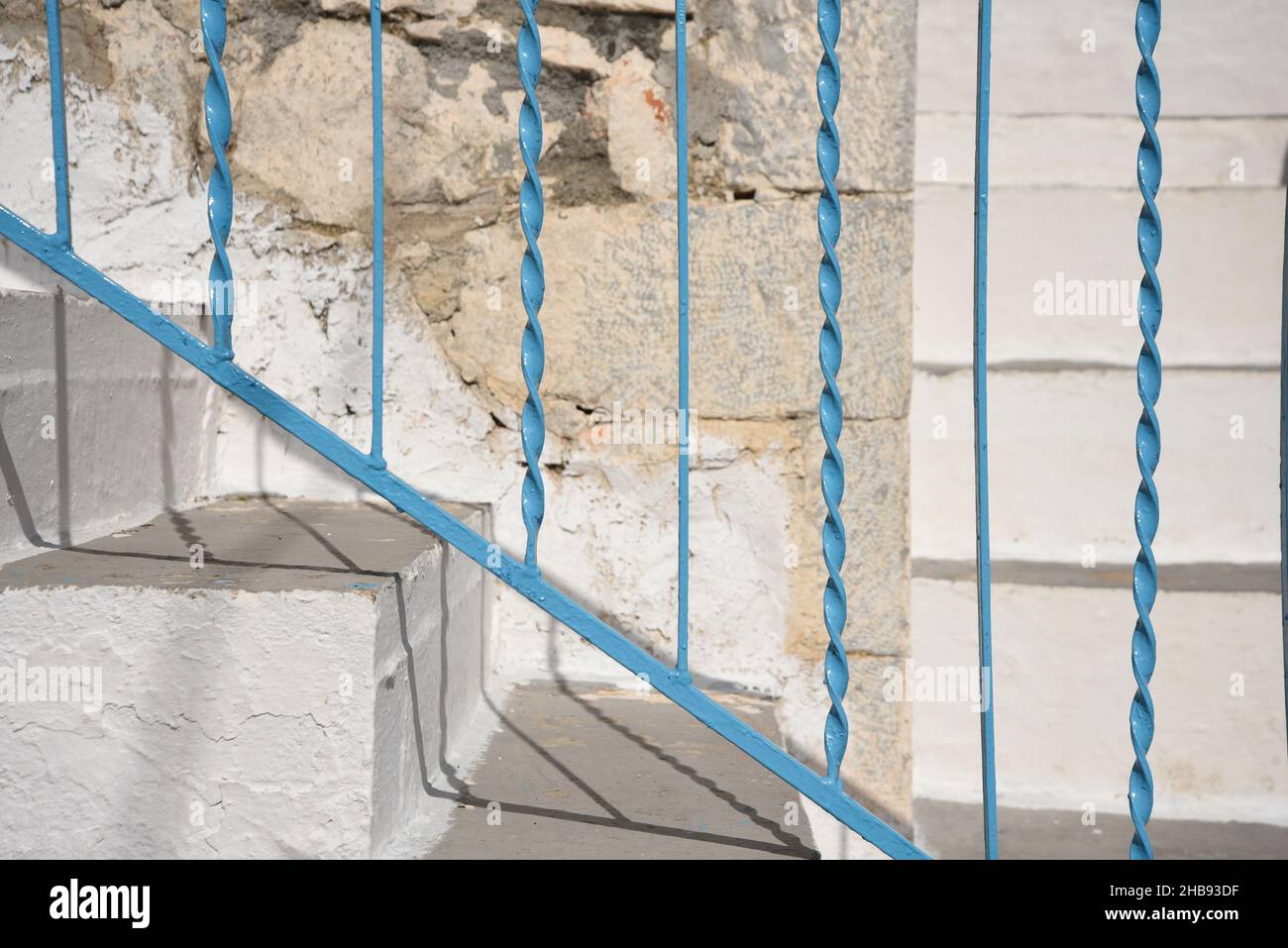 Greece Hand Railing Traditional custom made light blue wrought iron hand railing against a ...