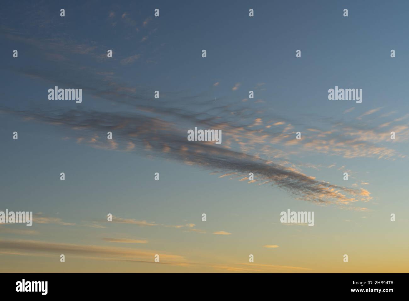 beautiful golden clouds at sunset on the mediterranean coast scenic sky background Stock Photo