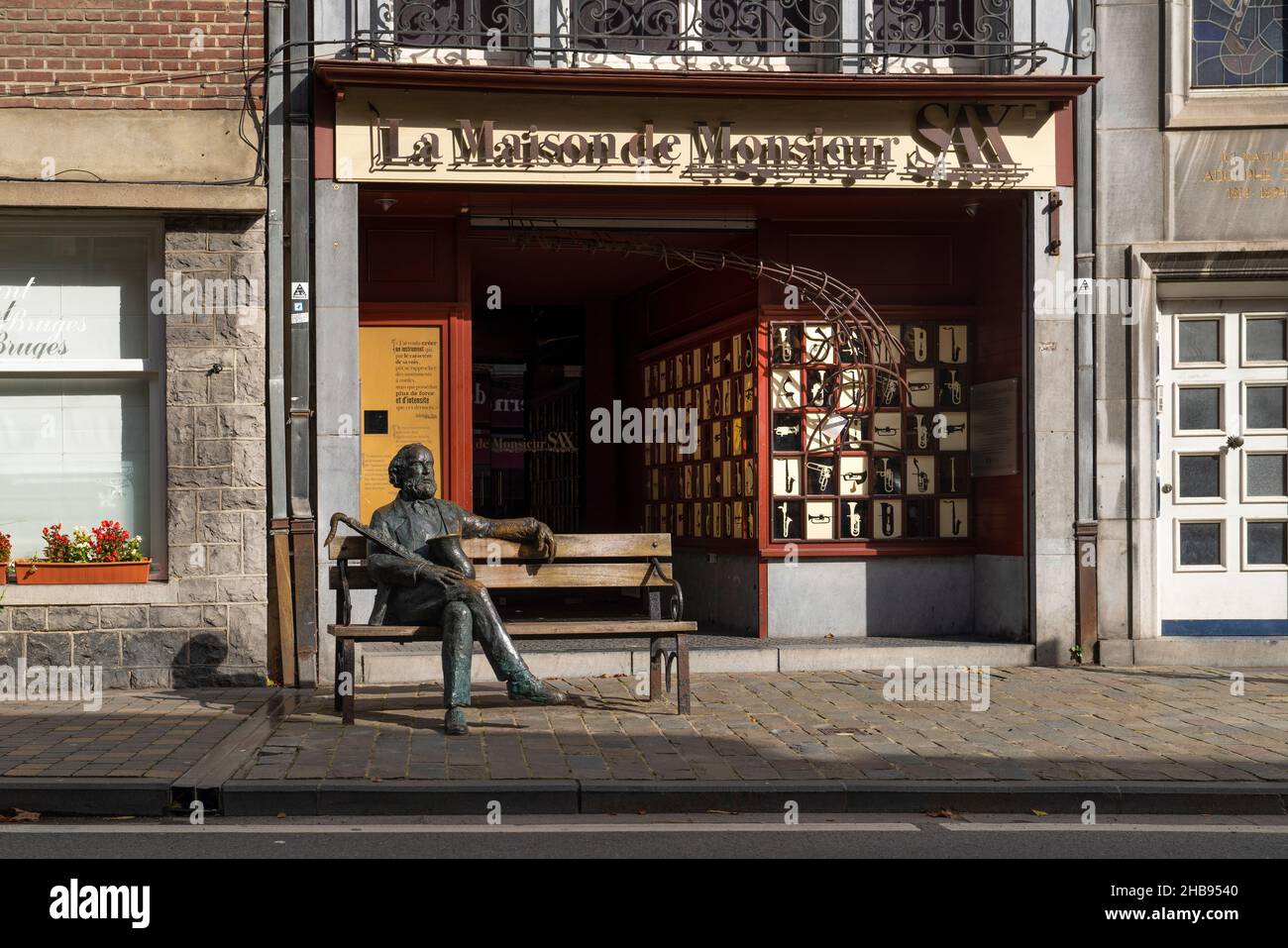 Dinant, Belgium - October 10 2019: Adolphe Sax Museum and sculpture of the inventor of the Saxophone Stock Photo