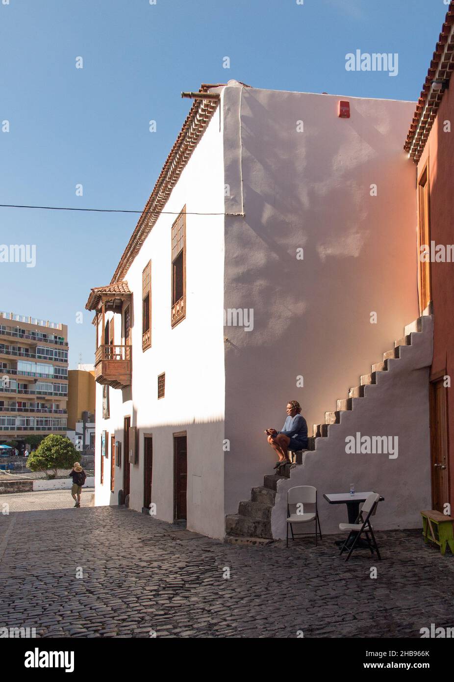Lonely man sitting on stairs hi-res stock photography and images - Alamy