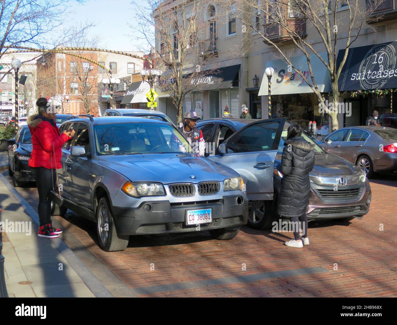 Automobile accident scene. Driver of parked car opened door into