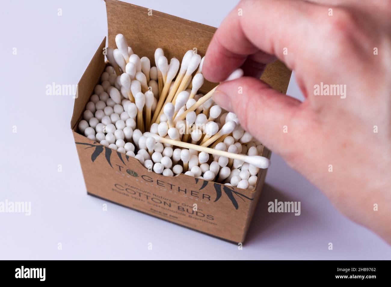 Opened box of eco friendly bamboo cotton buds Stock Photo