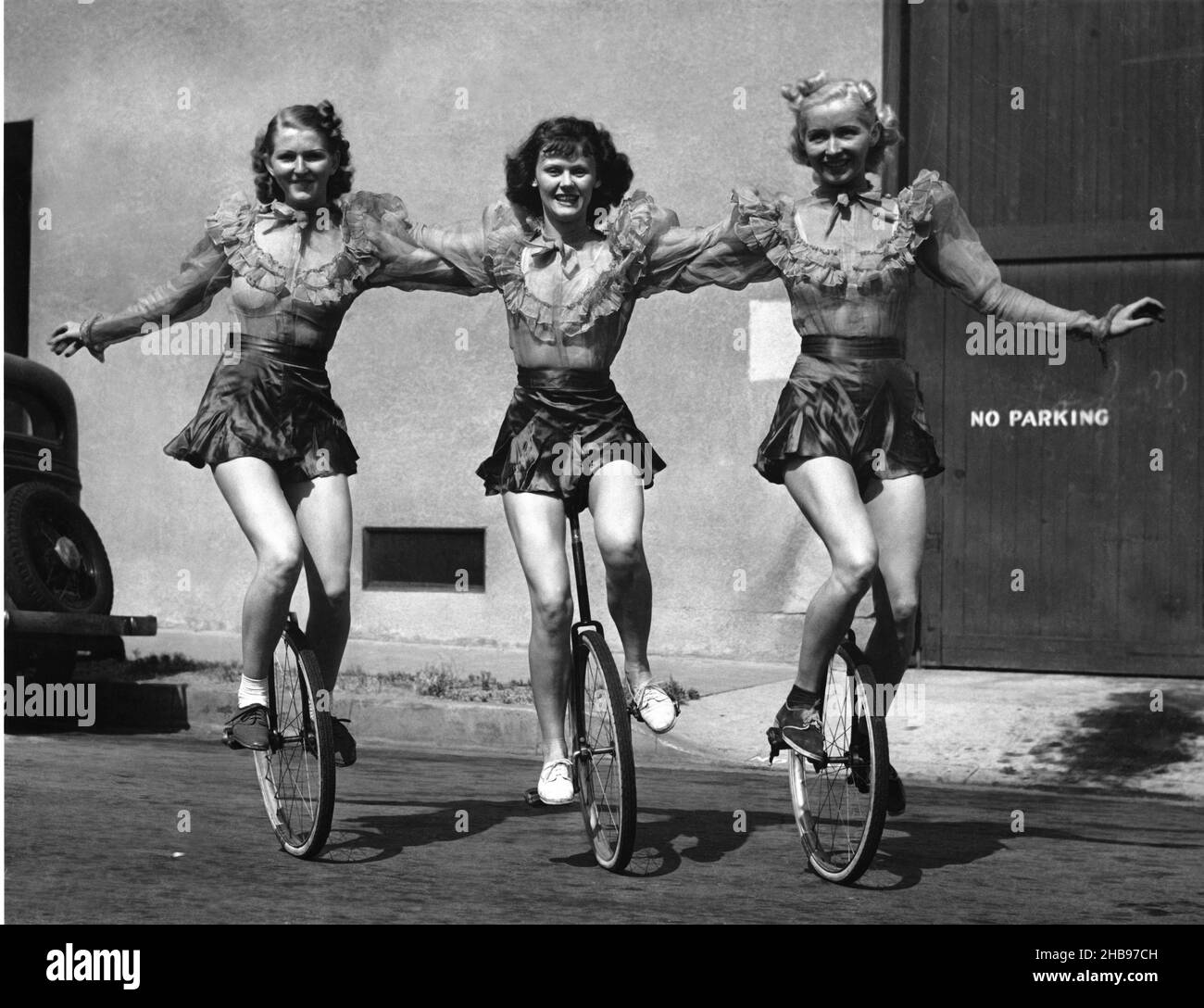 Riding a unicycle Black and White Stock Photos & Images Alamy