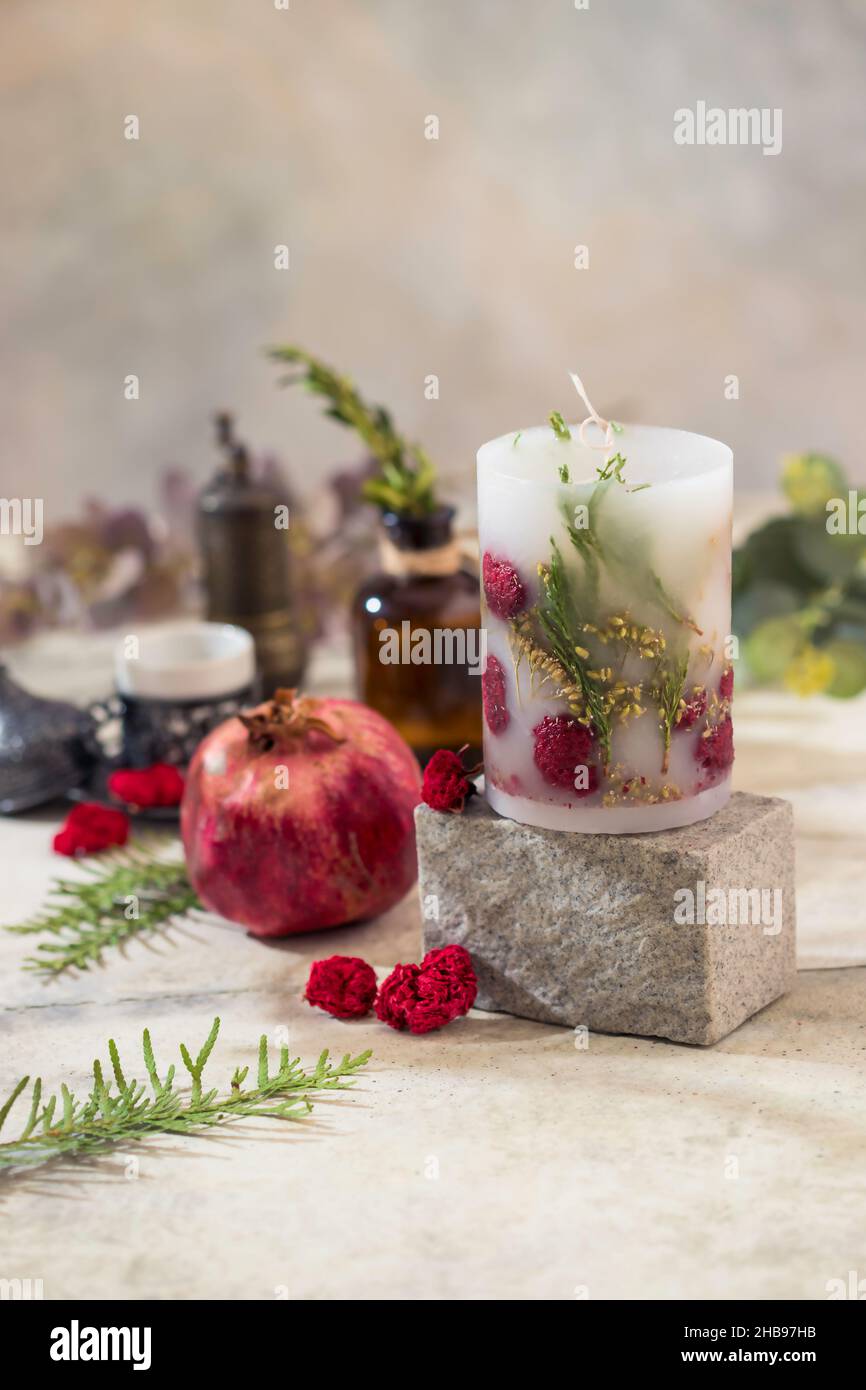 Handmade candles with dried flowers unique design. Scented candles  decorated by dry leafs and blooms. Selective focus Stock Photo - Alamy