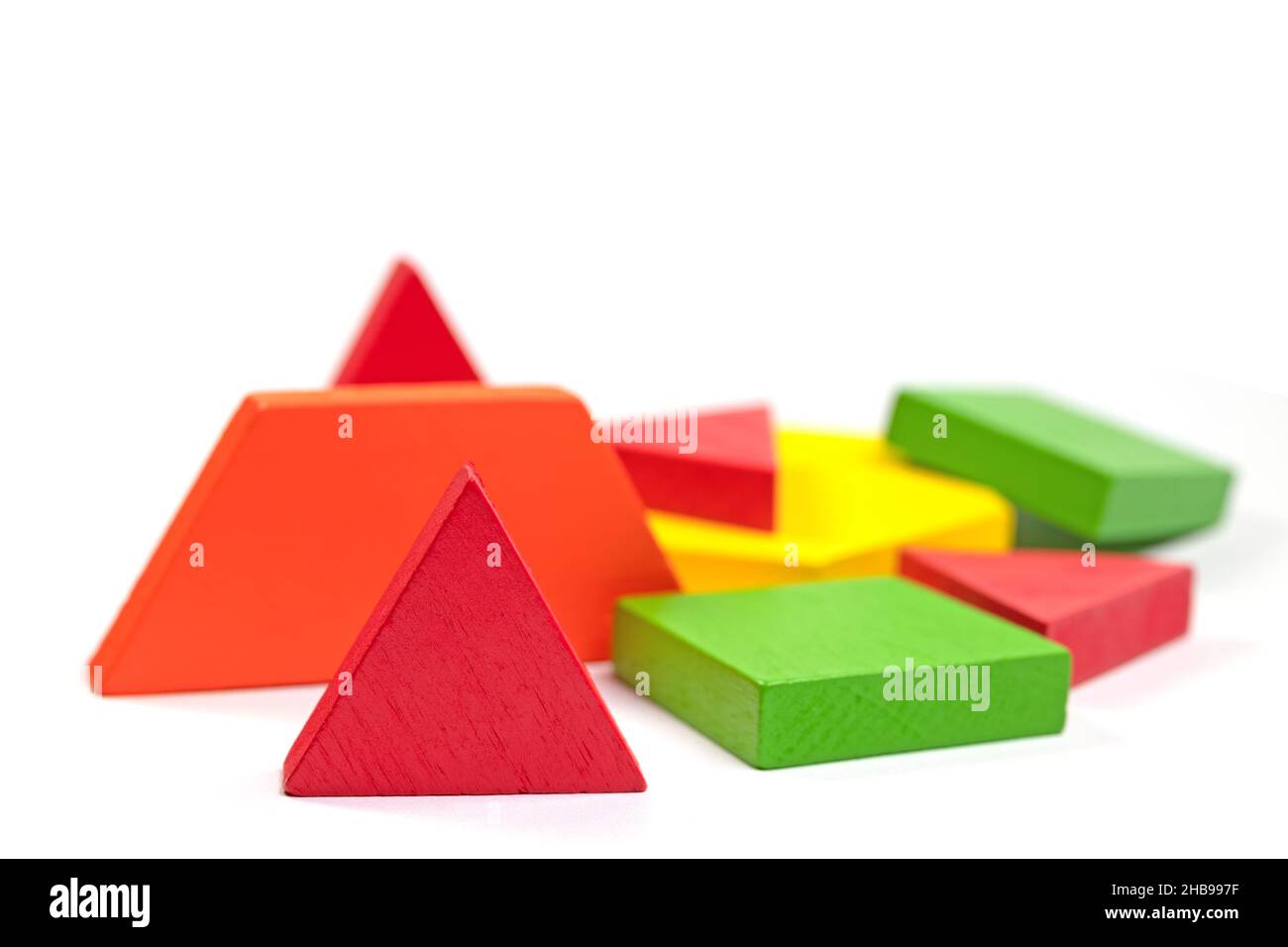 Colorful wooden blocks against a white background Stock Photo - Alamy