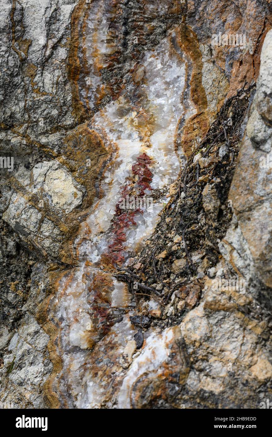 Quartz and agate vein fills of fracture in volcanic rock. Ecuador, South America. Stock Photo