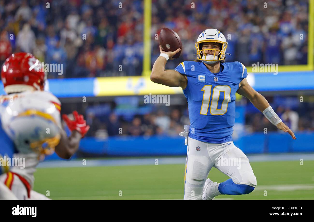 December 16, 2021 Los Angeles Chargers quarterback Justin Herbert (10)  scrambles with the ball during the NFL game between the Los Angeles Chargers  and the Kansas City Chiefs at SoFi Stadium in
