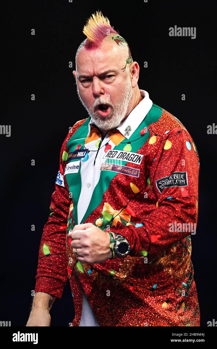 Peter Wright celebrates after winning the opening set against Ryan Meikle  during day three of the William Hill World Darts Championship at Alexandra  Palace, London. Picture date: Friday December 17, 2021 Stock