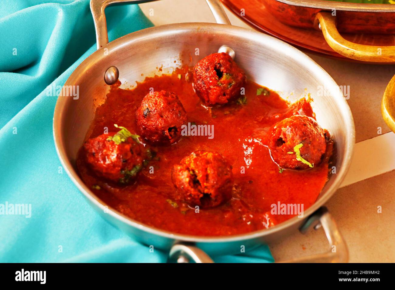 indian cuisine, tandoori meatball kebabs ( kofta ) in rich spicy tomato