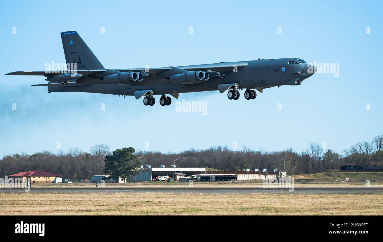 A B-52H Stratofortress takes off from the runway at Barksdale Air Force Base, Louisiana, Dec. 13, 2021. The B-52 is a long range heavy bomber, able to carry out a variety of assignments due to its high degree of versatility. (U.S. Air Force photo by Airman 1st Class William Pugh) Stock Photo