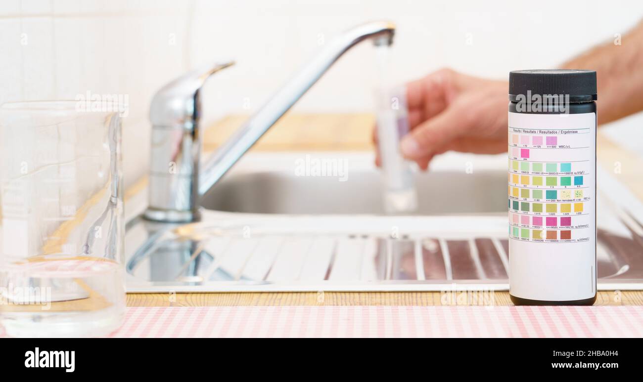 Checking the quality of tap water with a water test kit Stock Photo Alamy