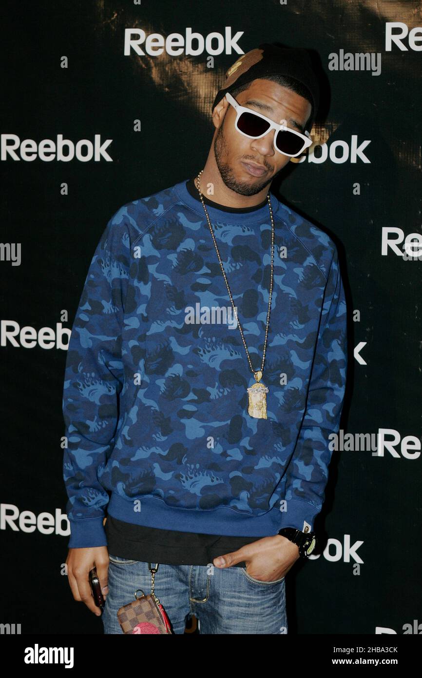 Popular rapper and musician Kid Cudi walks a red carpet and stops for some portraits. Stock Photo