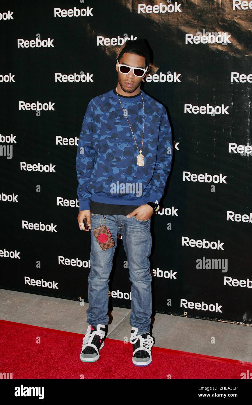 Popular rapper and musician Kid Cudi walks a red carpet and stops for some portraits. Stock Photo