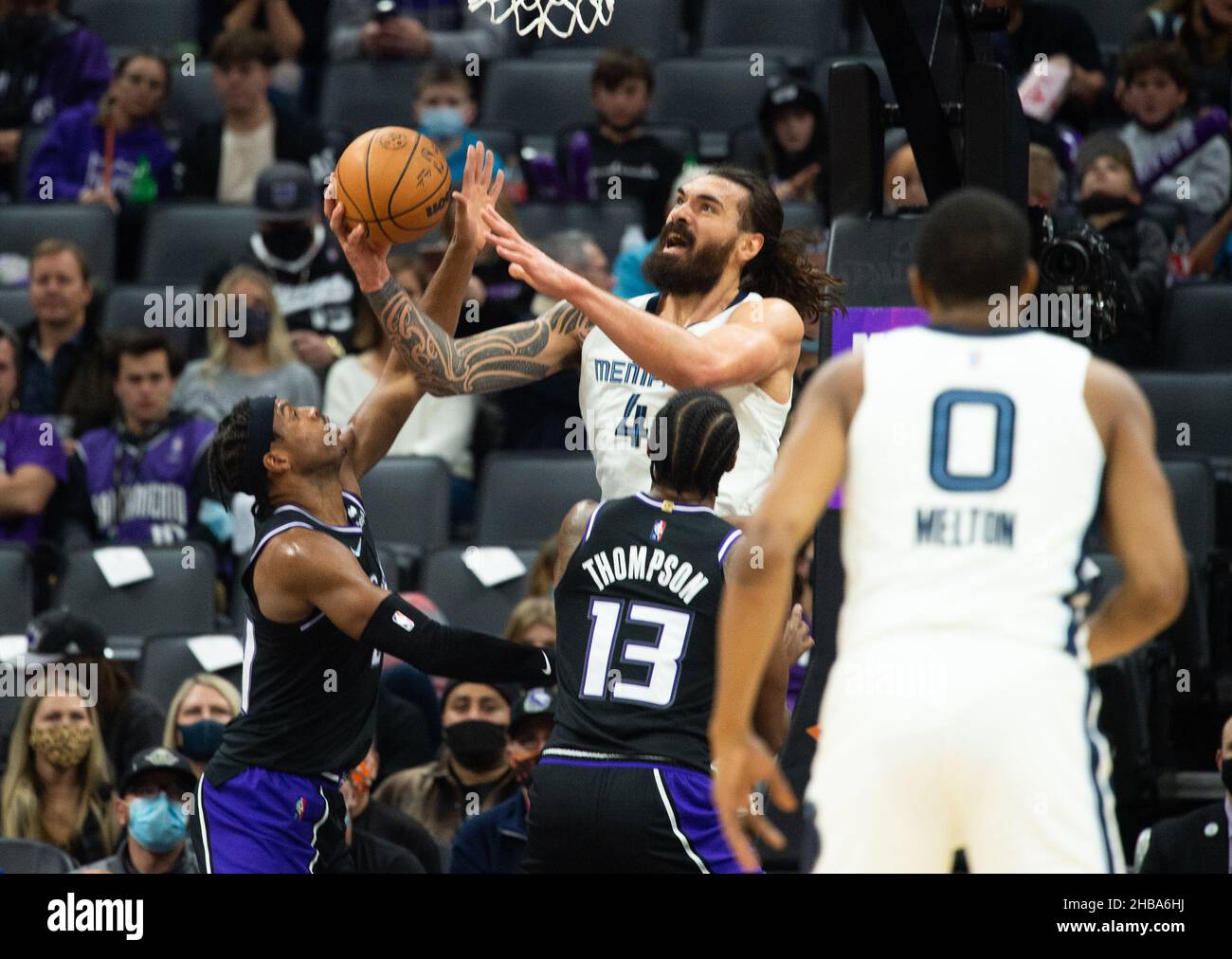 Sacramento, CA, USA. 17th Dec, 2021. Memphis Grizzlies center Steven Adams (4) goes to the basket past Sacramento Kings guard Buddy Hield (24) in the first half during a game at the Golden 1 Center on Friday, Dec 17, 2021, in Sacramento. (Credit Image: © Paul Kitagaki Jr. Credit: ZUMA Press, Inc./Alamy Live News Stock Photo