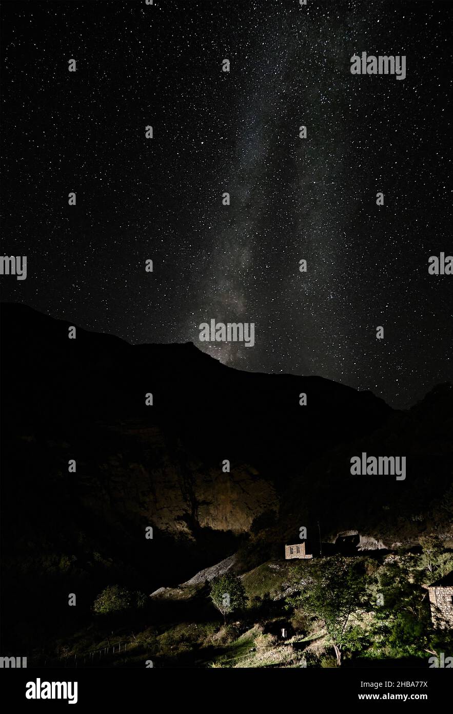 Dadivank Village at night, under deep dark night and Milky Way silhouette. Stock Photo