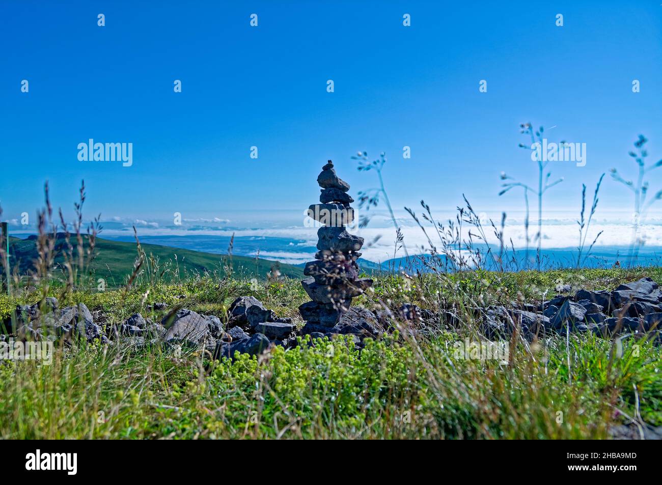 Cairn on the top of a volcano in Auvergne (France) Stock Photo