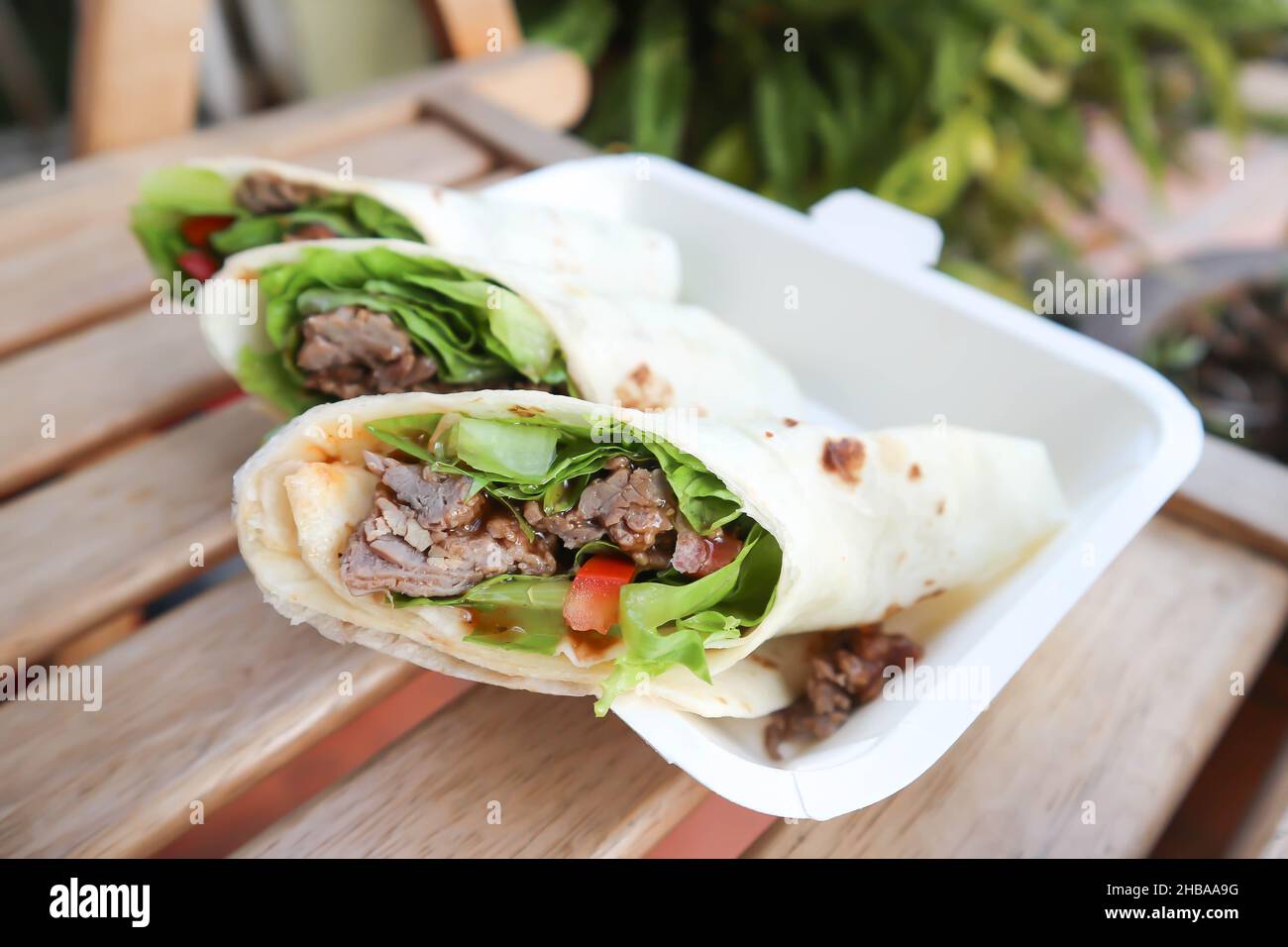 kebab ,pork wraps or taco or vegetable roll or mexican rolls or beef