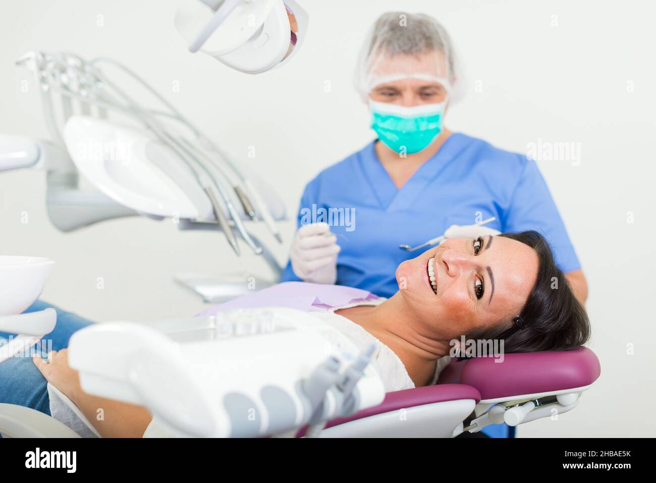 adult dentist checking teeth Stock Photo Alamy