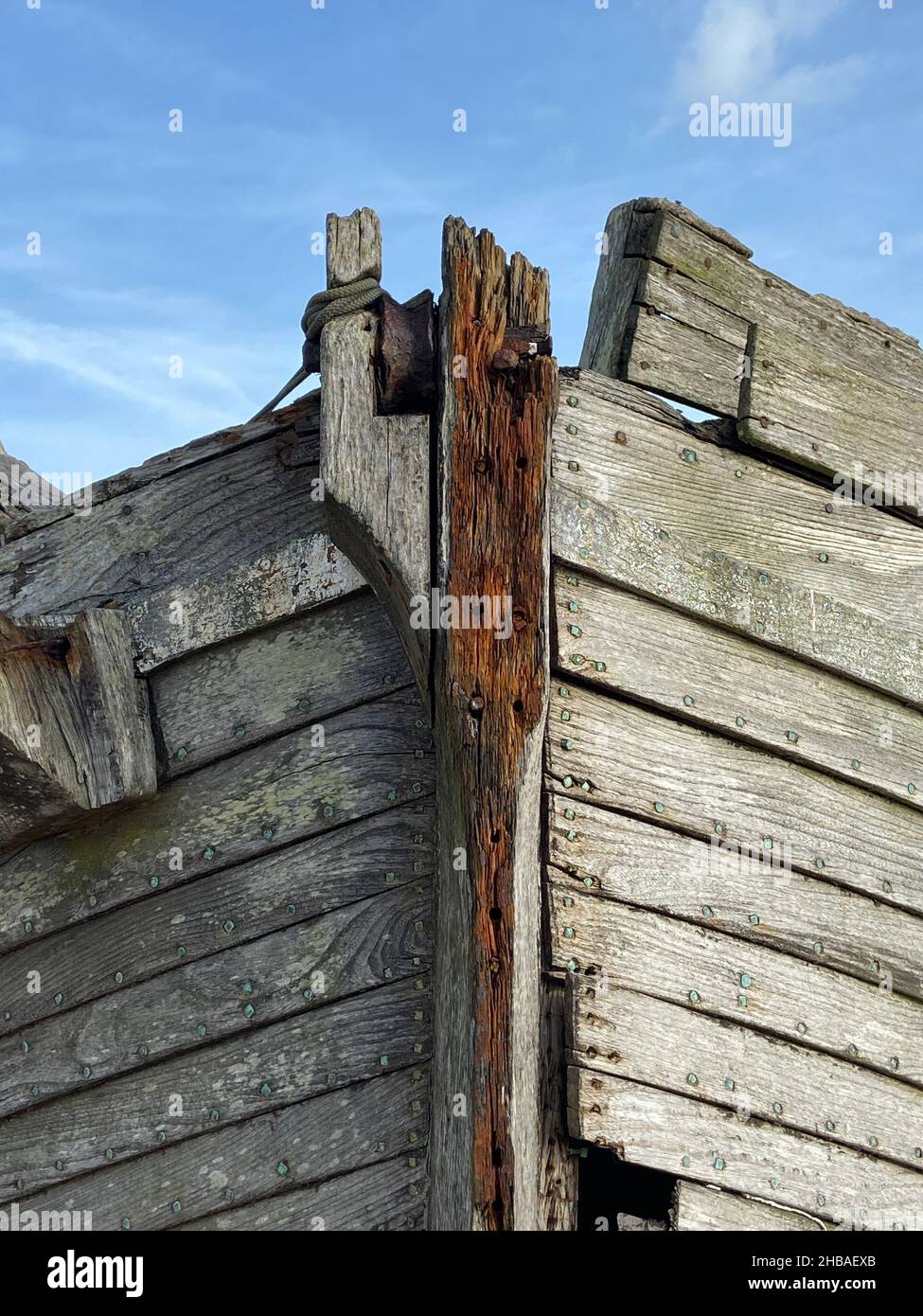 old boat hull wreck wooden and worn boat hull background on beach Stock ...