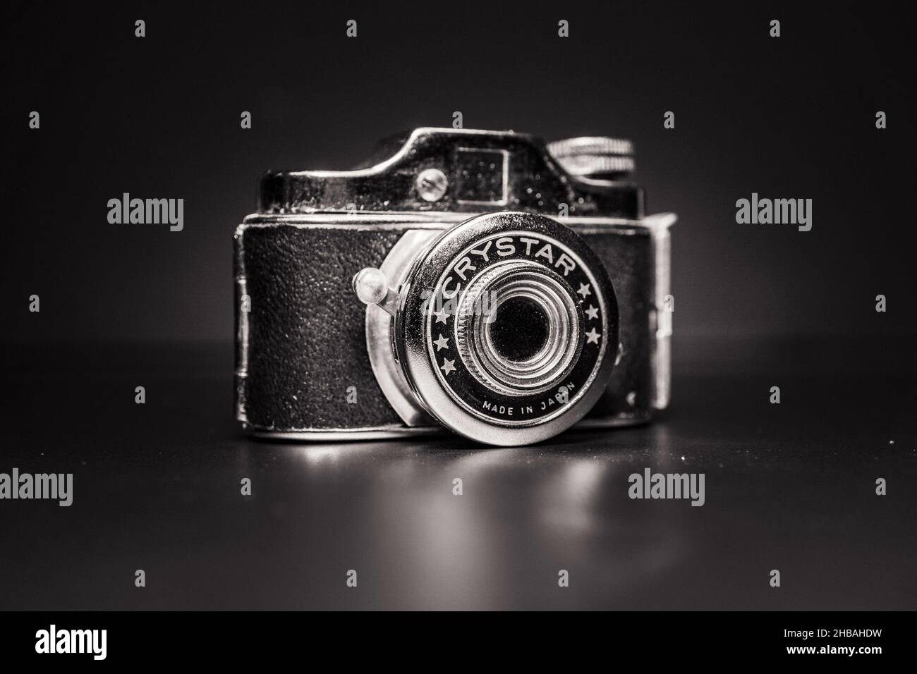 Closeup shot of a vintage camera in grayscale Stock Photo
